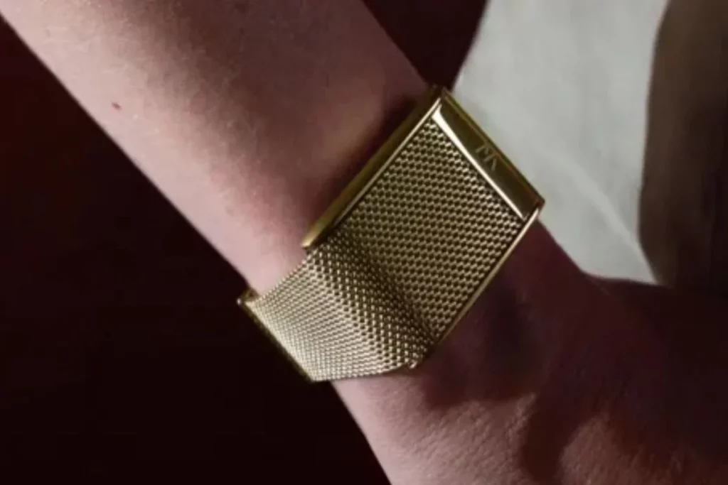 Woman wearing WHOOP Meridian in Gold